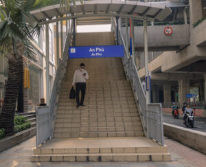 Stairway and entrance sign at An Phú Metro Line 1 station near Thảo Điền