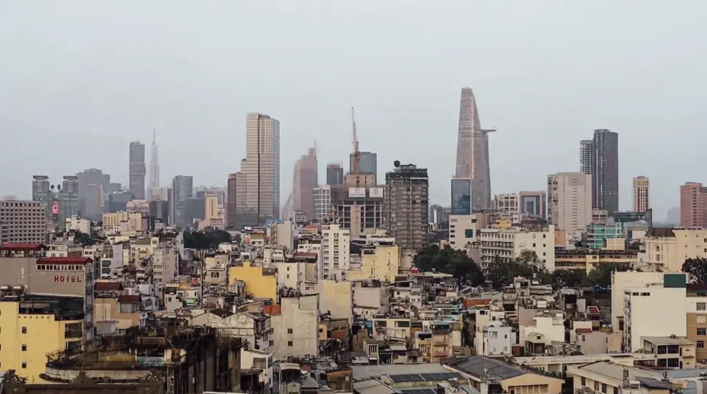Saigon rooftops and city skyline with Bitexco Financial Tower