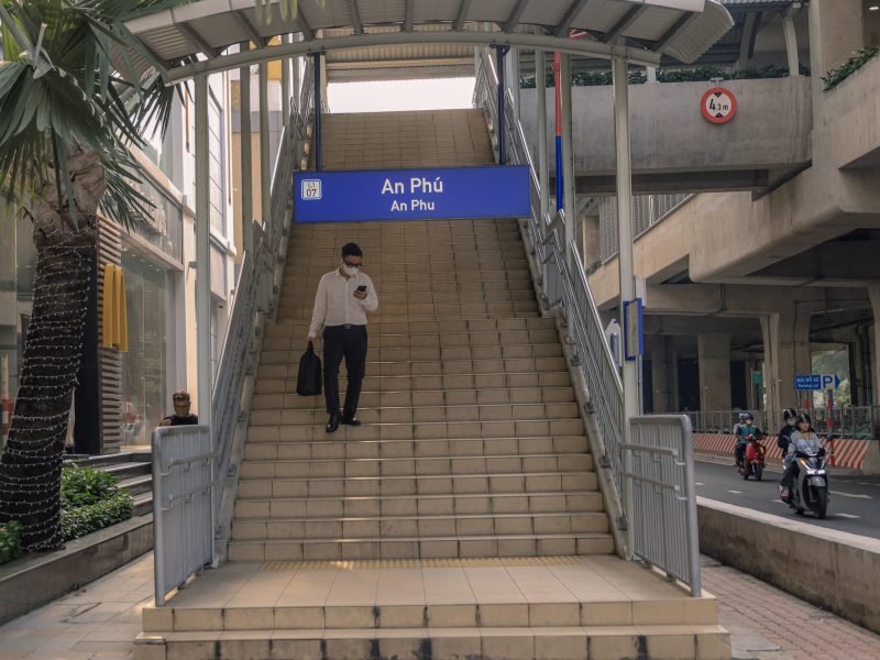 Stairway and entrance sign at An Phú Metro Line 1 station near Thảo Điền